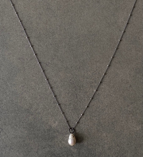 The Petite Collection Long Blackened Sterling Silver Necklace with White Baroque Pearl Pendant